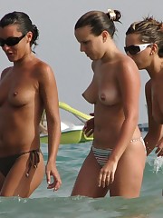Big Jugged Teens Topless on the Beach